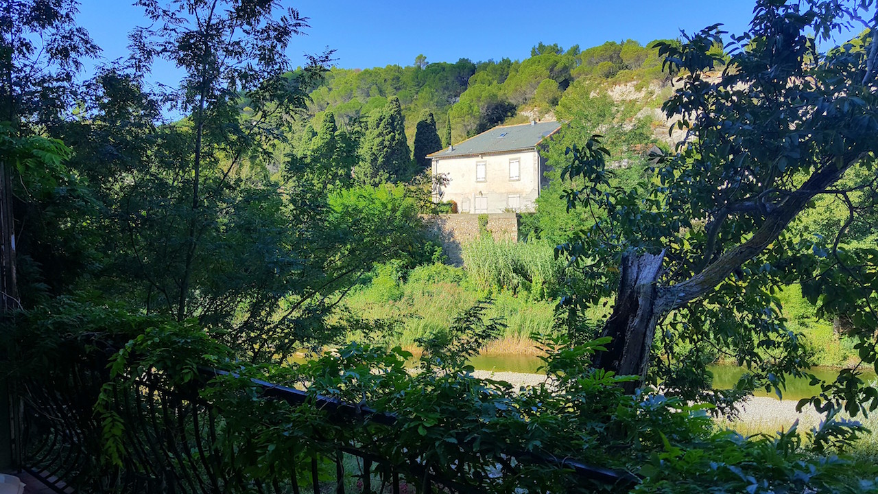 Balcony view across the beach and river to the other side.