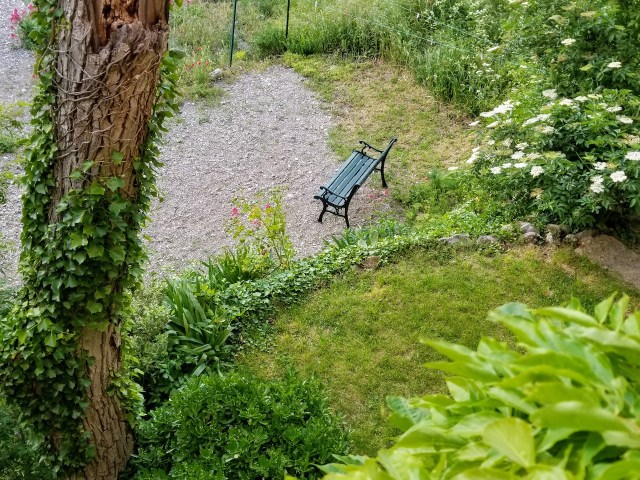 Looking down to the garden terrace, beach.