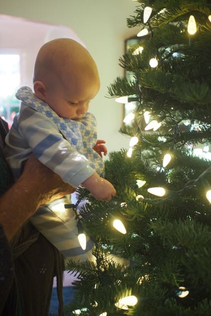 Seb with Xmas tree lights.